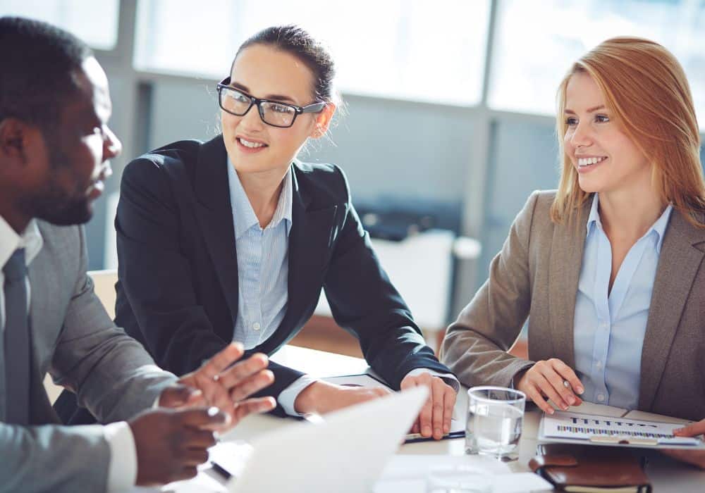 Wealth Builders Haven strategists reviewing a retirement income blueprint with a client